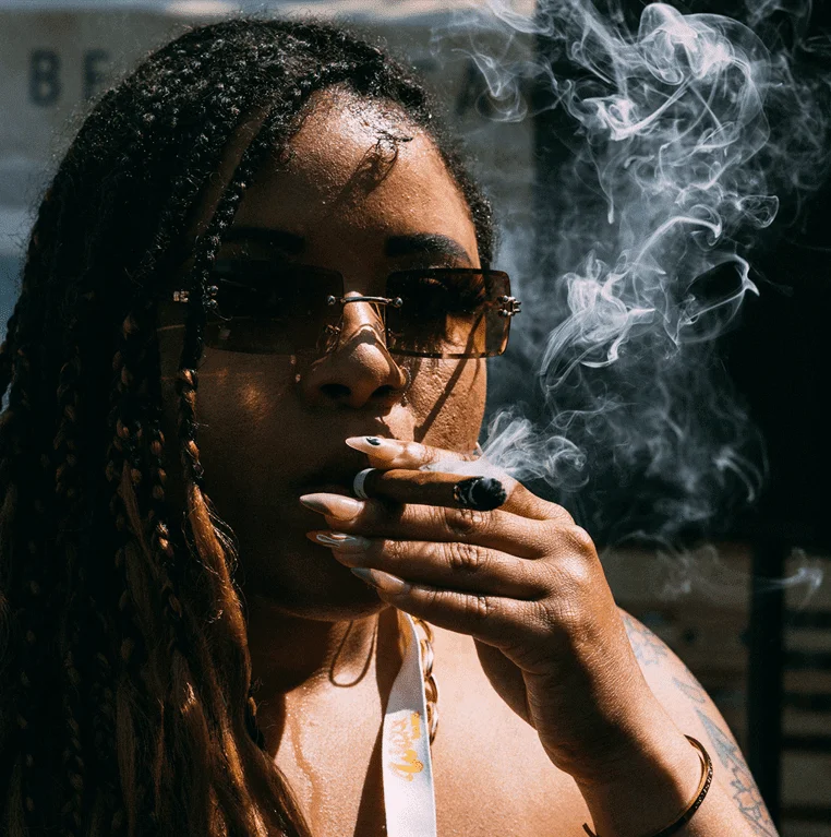 girl smokes Cannabis Blunt APE