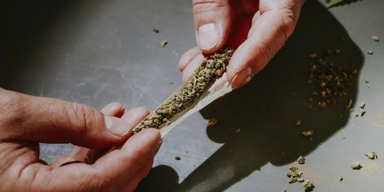 a person making joint
Pink Rozay strain