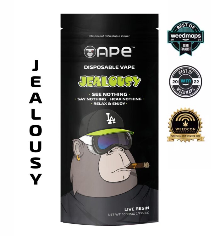 Jealousy strain disposable vape pen with golden live resin oil and vibrant packaging, surrounded by citrus and cream notes