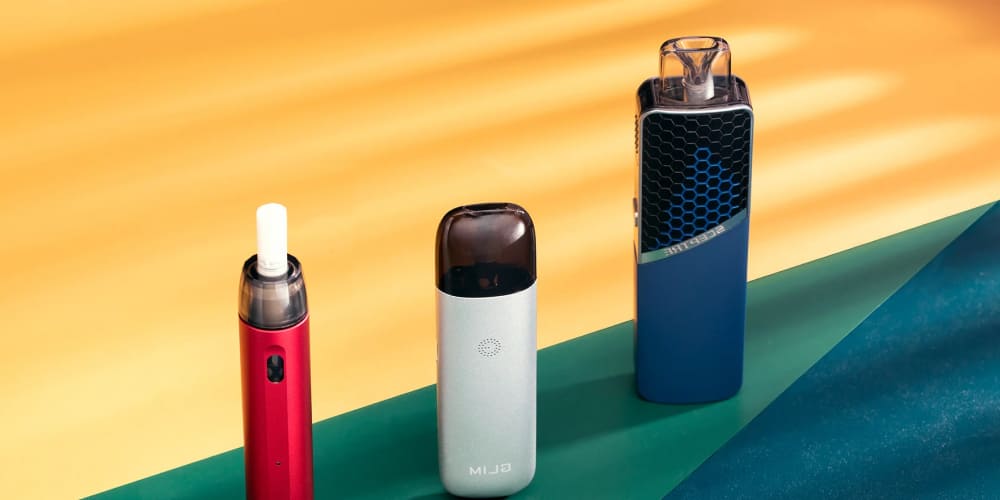 A stylish tube mod vaping device, shaped like a traditional cigarette.