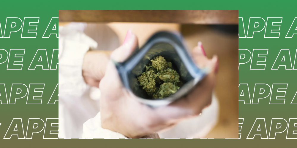 San Bernardino Weed Delivery Service Three white pre-rolled joints next to a pile of ground cannabis on a black table
