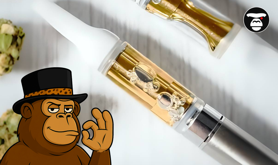 Top 5 Weed Sauce cartridges in Oakland Two golden oil vape cartridges with white tips, with an ape mascot doing an "OK" sign.