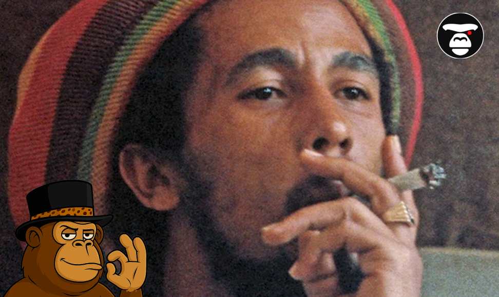 How Cannabis Shaped Modern Music: From Jazz to Hip-Hop A close-up of Bob Marley smoking a joint or cigar, wearing a striped knit hat.