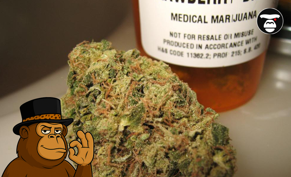 A cannabis bud sitting in front of a blurry, amber-colored medical marijuana prescription bottle with a partially visible label. The label includes the words "STRAWBERRY D..." and "MEDICAL MARIJUANA".