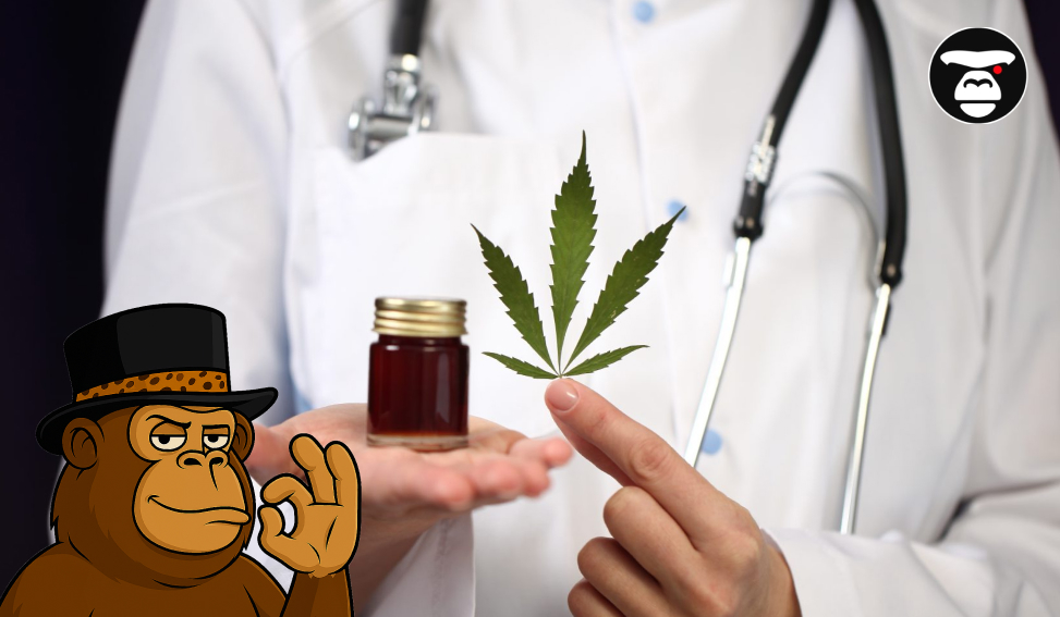 A doctor in a white coat holding a cannabis leaf and a small jar of cannabis oil.