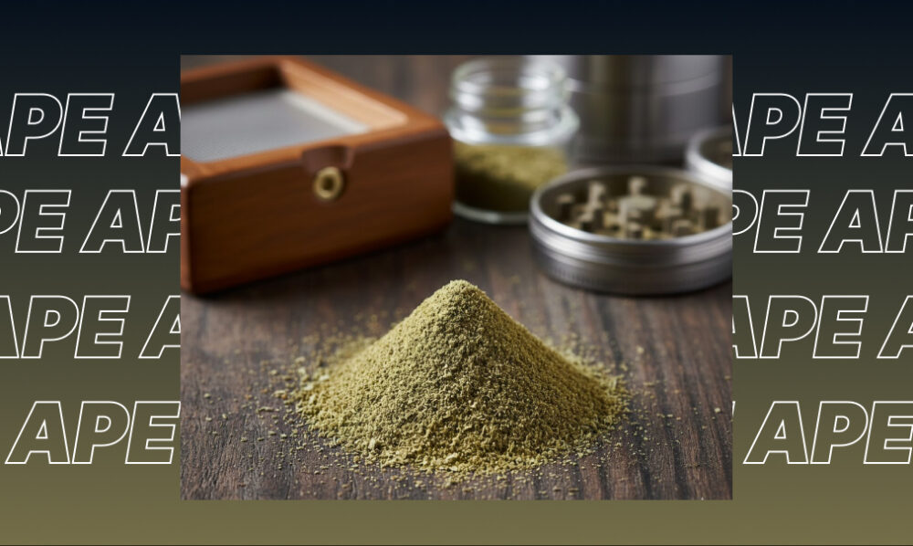 A pile of green cannabis kief on a wooden table next to a grinder and a sifting box with "APE" text in the background.