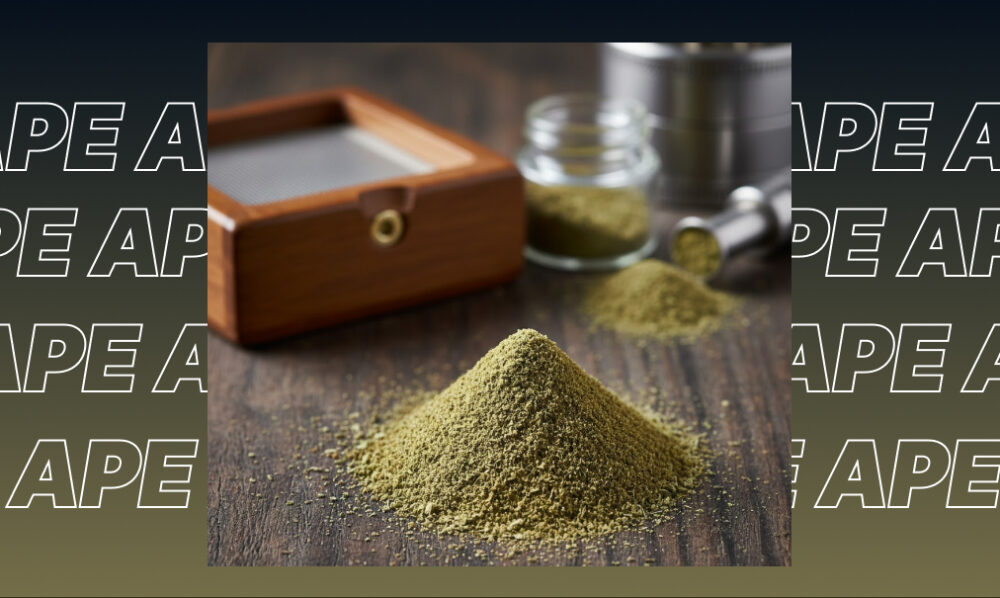 A wooden sifting box with a pile of green kief and a glass jar on a dark table.